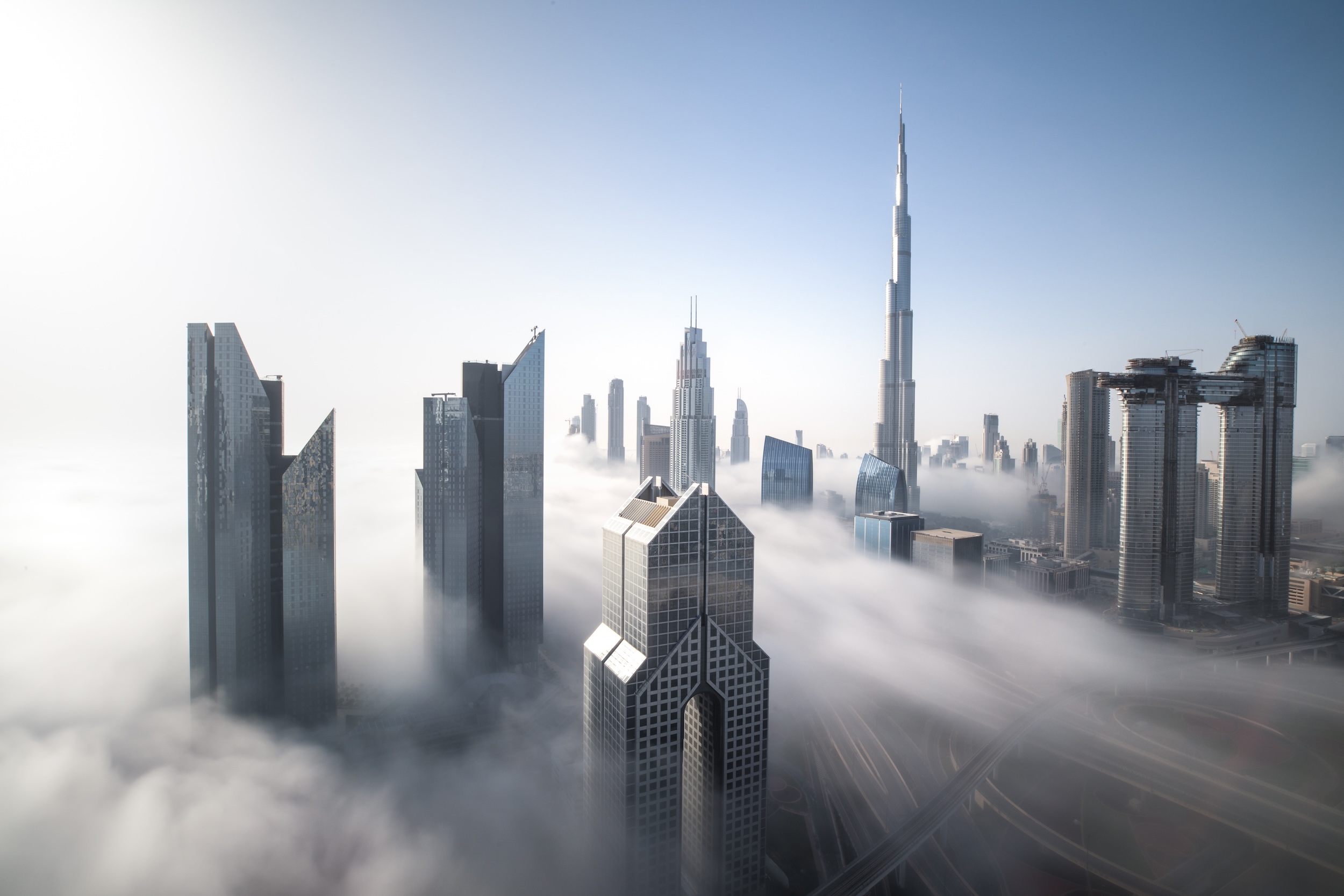 Dubai downtown skyline above the clouds